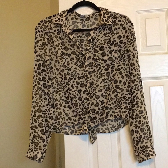 Animal print blouse V-neck ties at the bottom